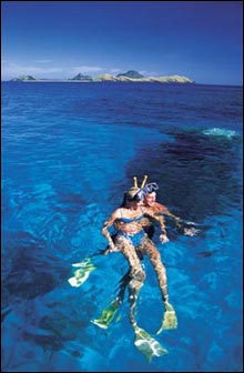 Snorkeling Fiji reefs, one of the main tourism activities