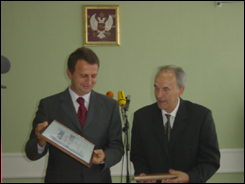 Mr. Brkovic receiving the IQNET certificate for Quality Management System during Anotech's first anniversary