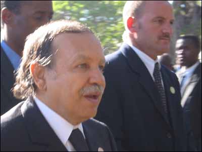 Algerian President Abdelaziz Bouteflika enters the summit.