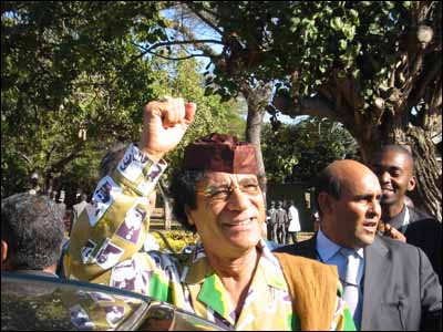 Libyan leader Col. Muammar Gaddafi greets the crowds.