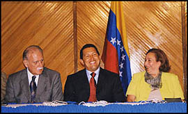 President Chavez with Luisa Romero, Minister of Production and Trade and Joe Vicente Rangel, Minister of Foreign Affairs during a Tourism Congress in Margarita, October 2000
