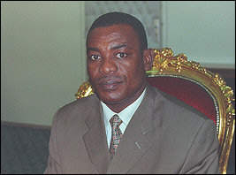 Mr. S.E. Affi N'Guessan, Ministre de l'Industrie et du Tourisme