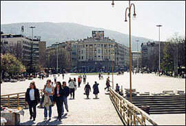 Tourists crossing the Stone Bridge